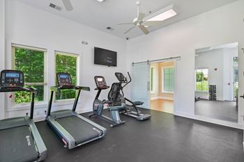 A gym with treadmills